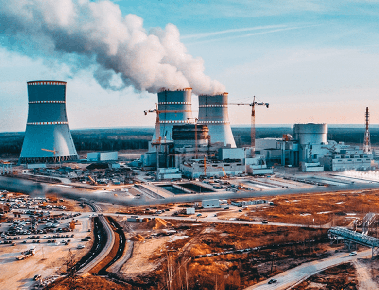 Panoramic view of industrial plant with steam towers dangerous for ecology and environment producing